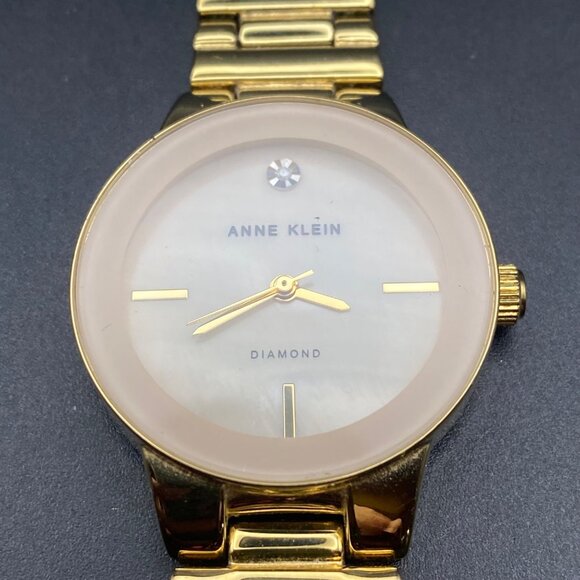 Anne Klein Accessories - Anne Klein Womens Gold Tone Diamond Watch MOP Dial New Battery Runs AK2670